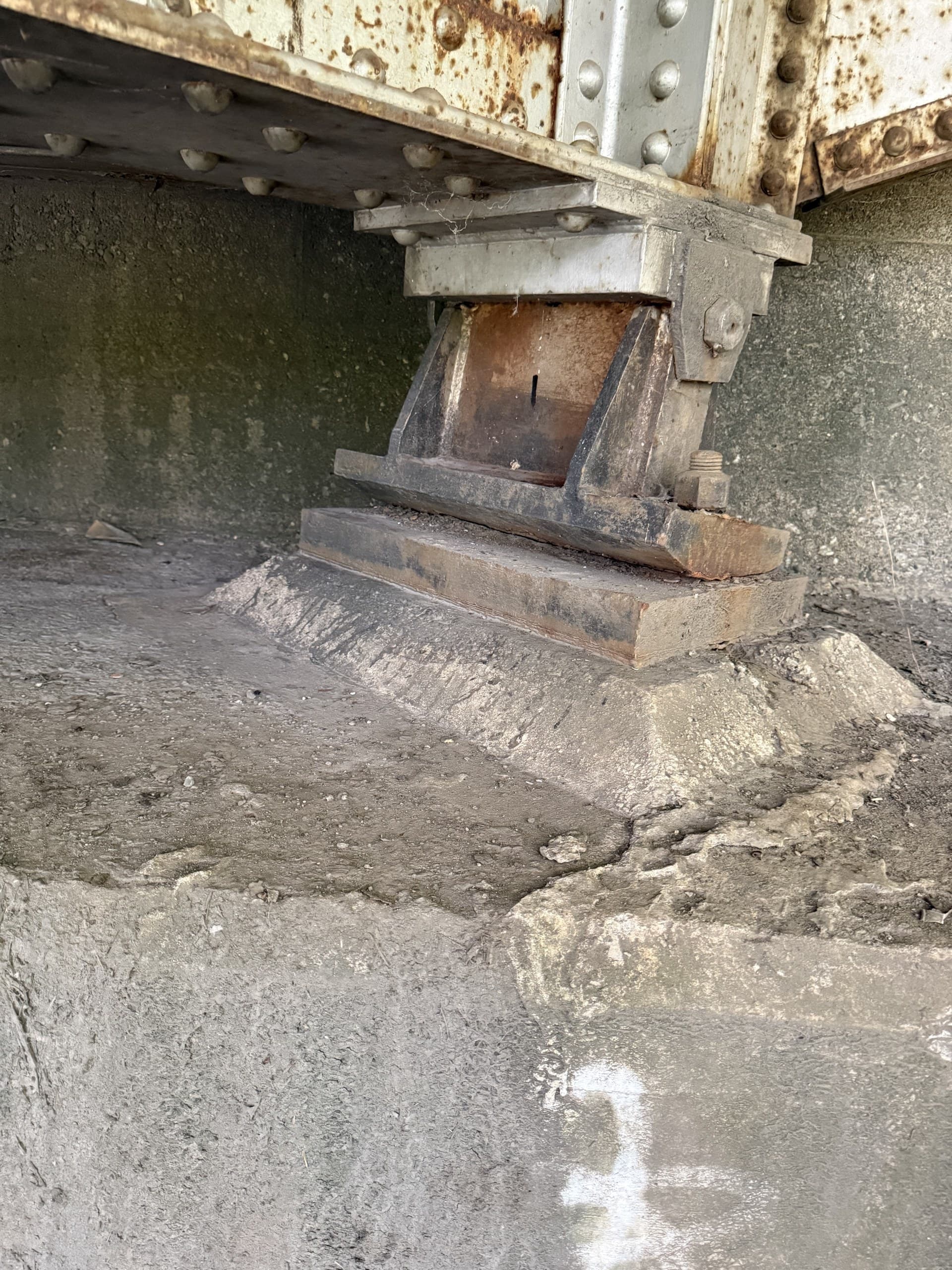 Steel girder bearing on a concrete pier measured for an as-built record