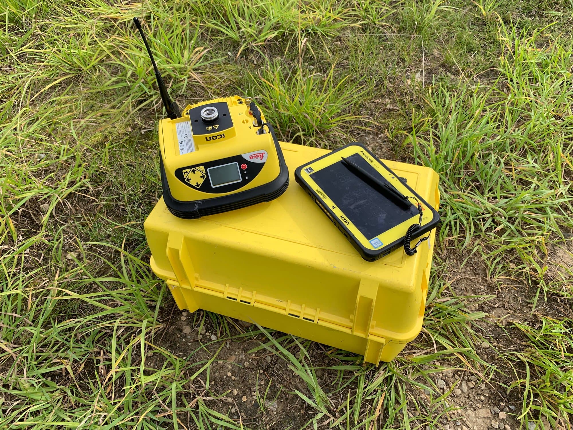 GNSS base station and rugged tablet on an equipment case