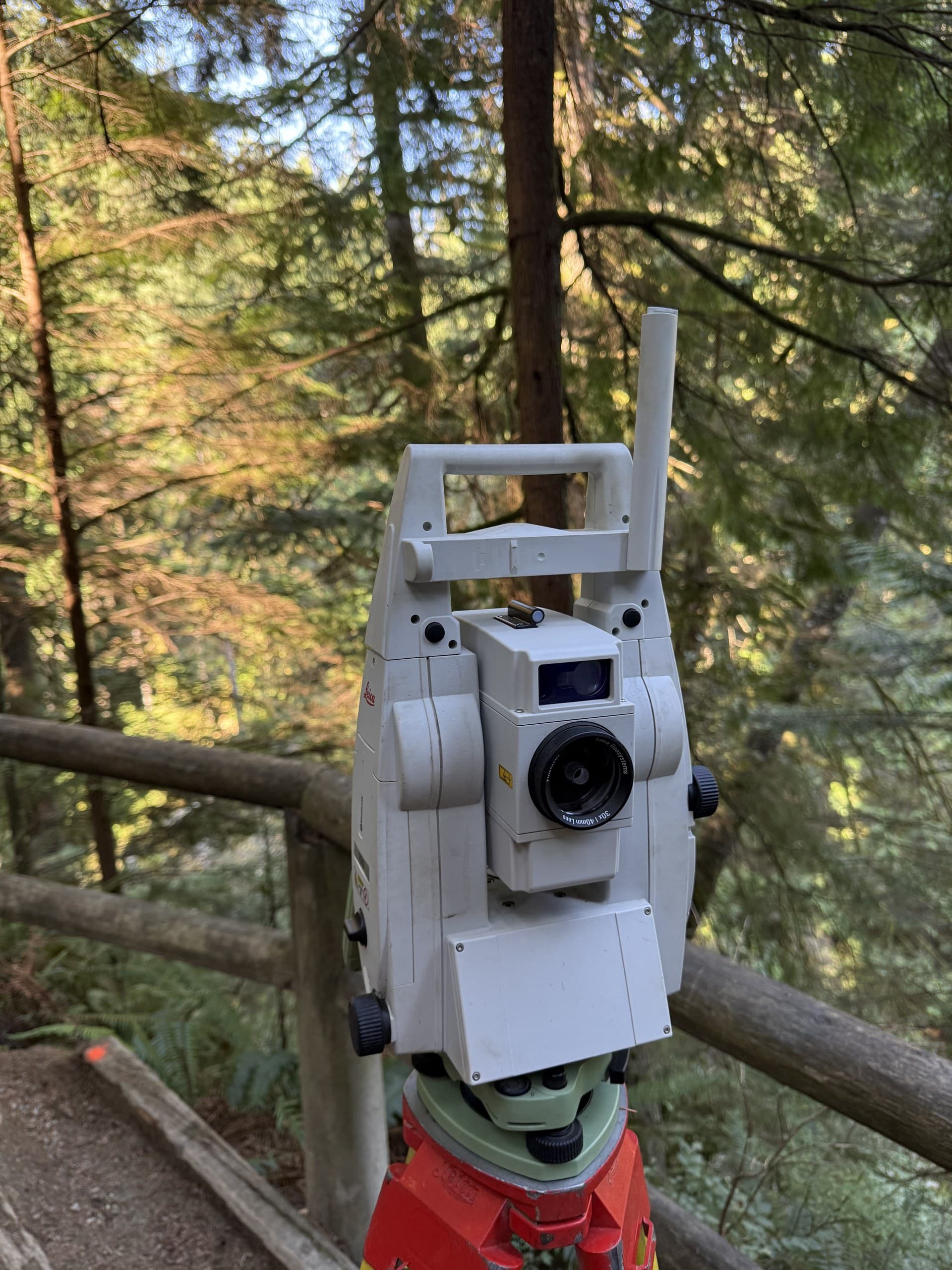Total station working beneath forest canopy where GNSS can't see the sky